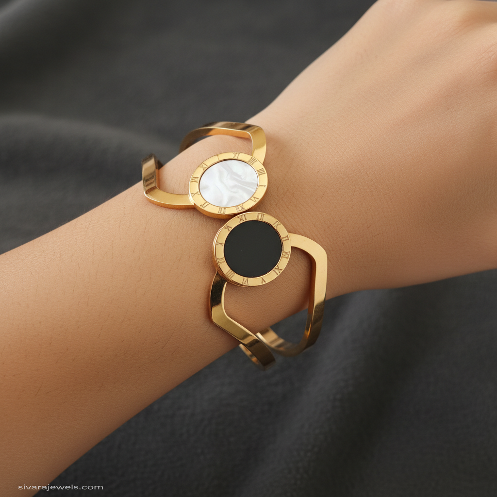 Beautiful slender wrist with gold and mother-of-pearl bracelet