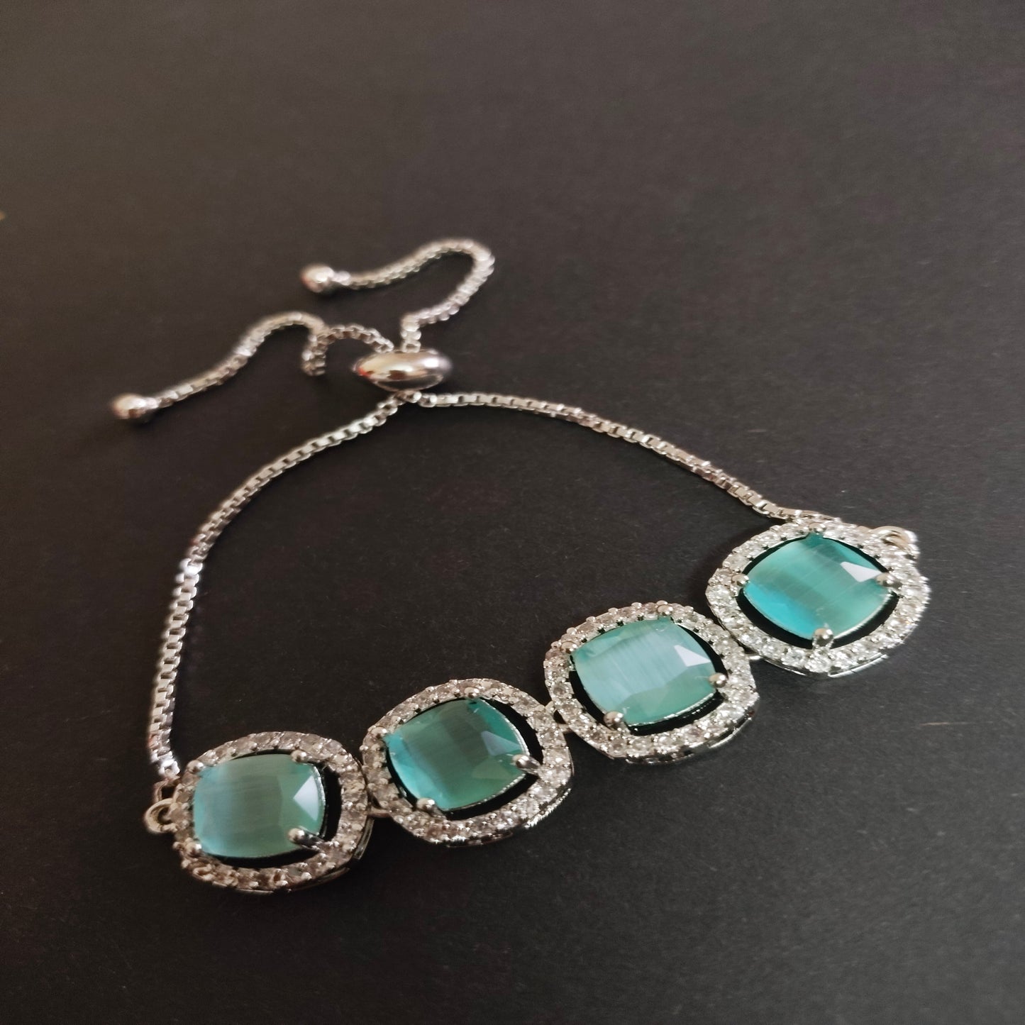SIVARA Aqua Blue Cushion-Cut Stone Bracelet with CZ Halo | Adjustable Elegant Jewelry