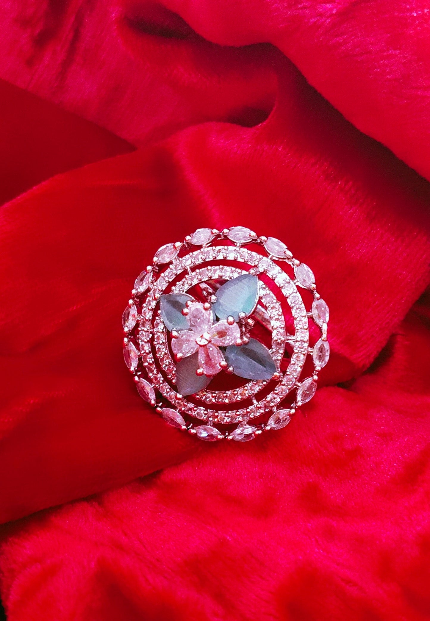 SIVARA Moonlit Bloom Spiral Ring | Icy Blue Floral Statement Ring with Teardrop Elegance | Adjustable