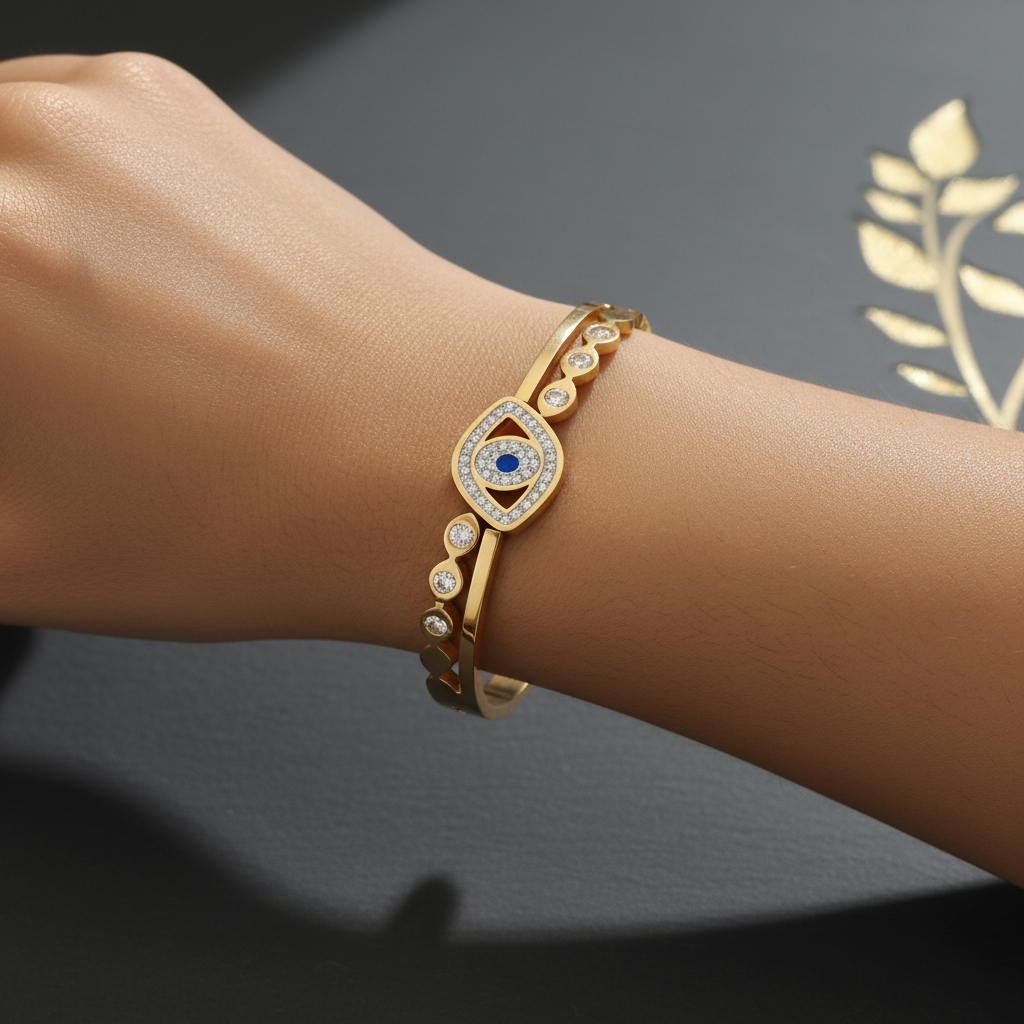 Beautiful slender wrist with evil eye and disc bracelet