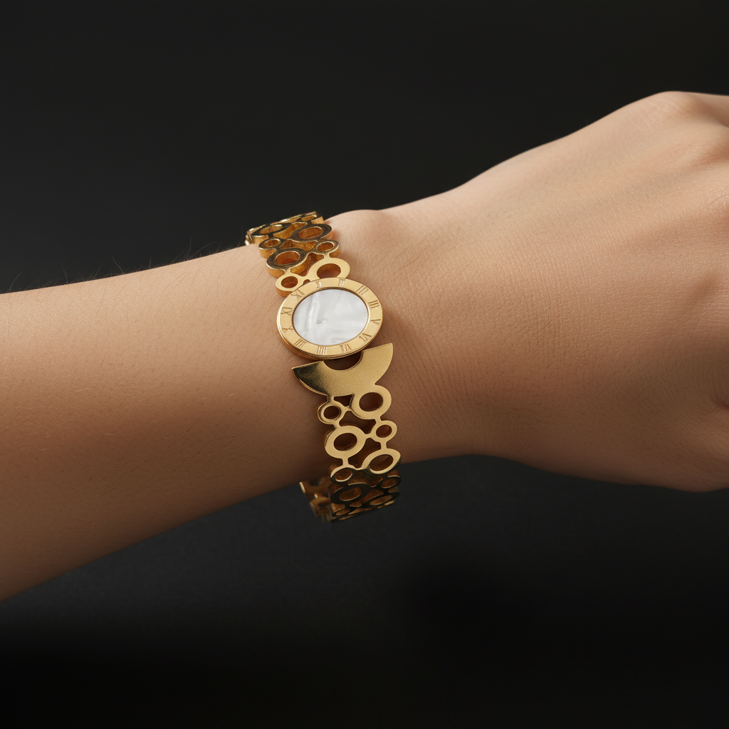 Beautiful slender wrist with mother of pearl and circular ring bracelet