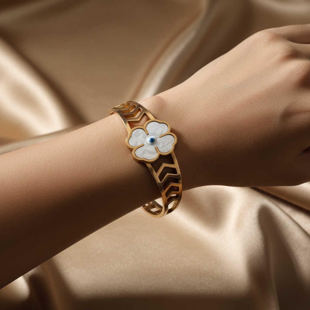 Beautiful slender wrist with mother of pearl flower bracelet