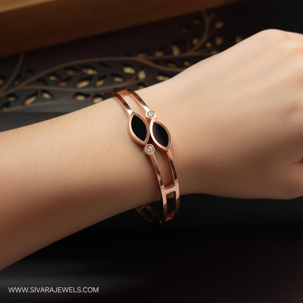 Beautiful slender wrist with rose gold black enamel marquise and diamond bracelet