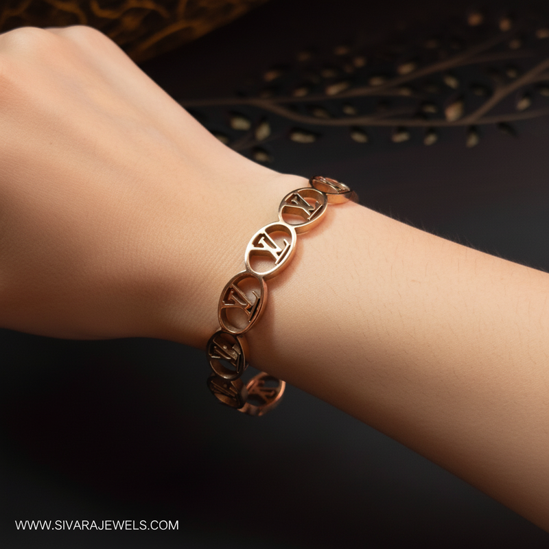 Beautiful slender wrist with rose gold interlocking LV chain bracelet