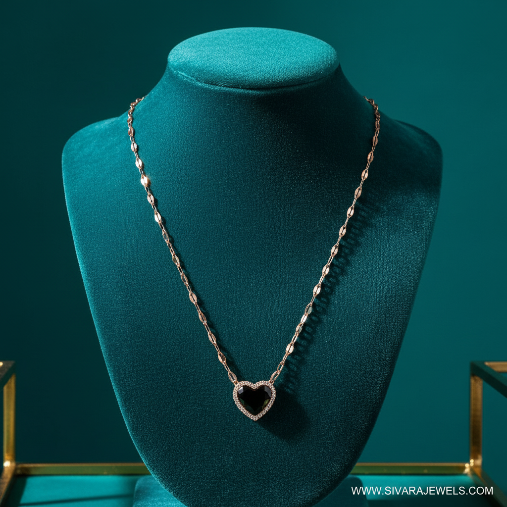 Black Heart Pendant Necklace on Teal Velvet