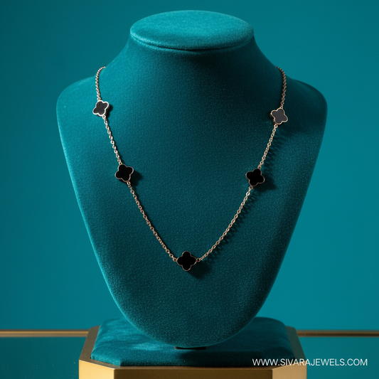 Black Onyx Clover Station Necklace on Teal Velvet