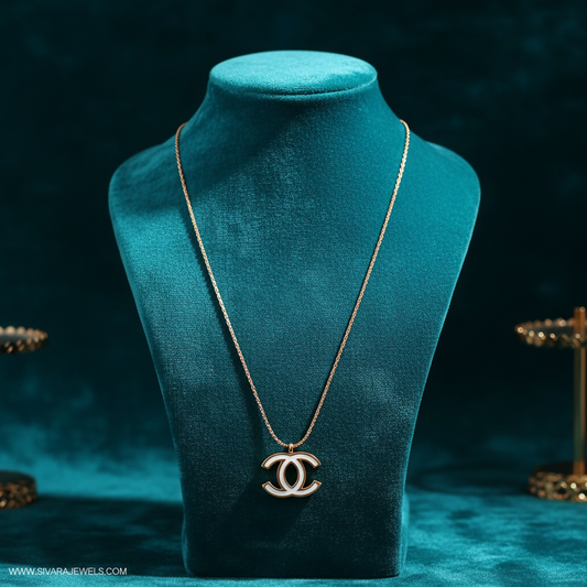 CC Logo Pendant on Teal Velvet