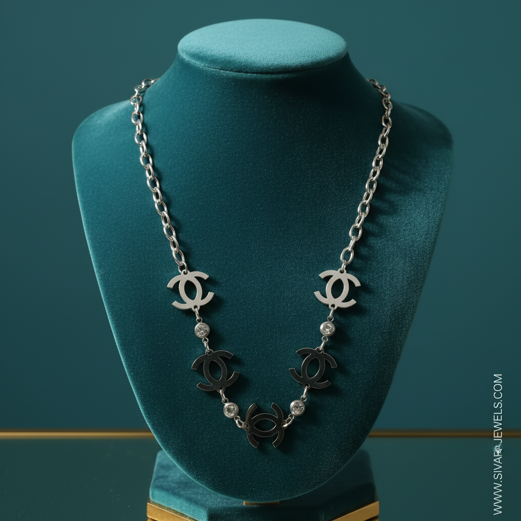 Chanel CC Logo with Crystals on Teal Velvet
