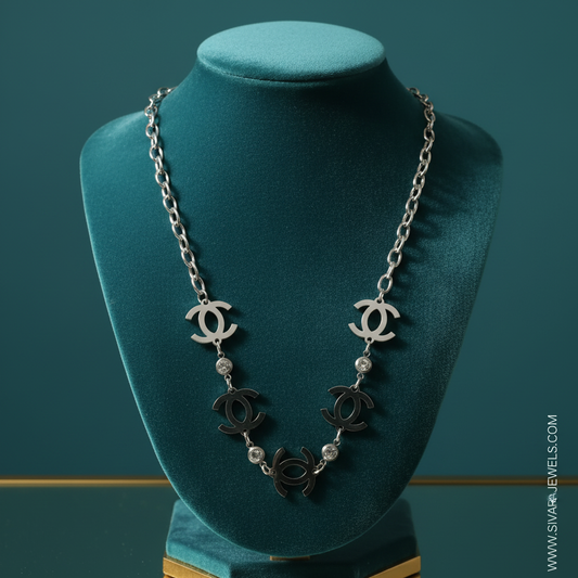 Chanel CC Logo with Crystals on Teal Velvet
