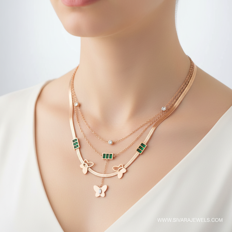 Emerald Bar and Butterfly Necklace on Slender Neck