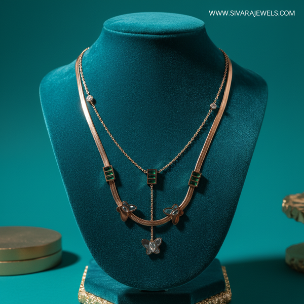 Emerald Bar and Butterfly Necklace on Teal Velvet