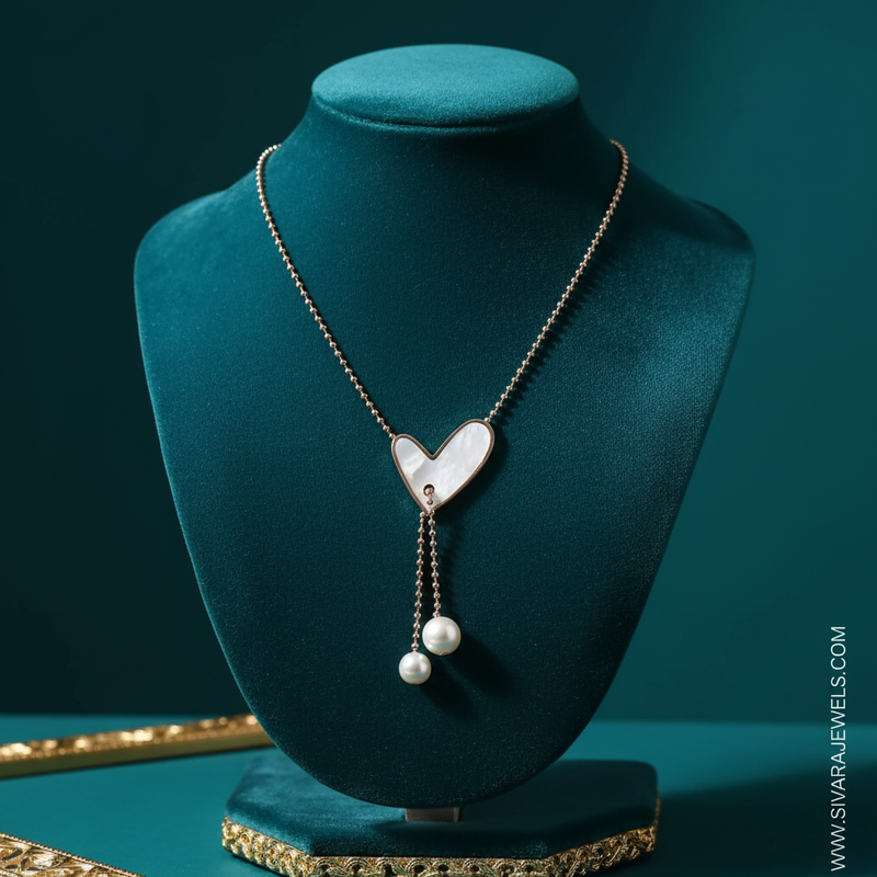 Heart with Mother of Pearl on Teal Velvet