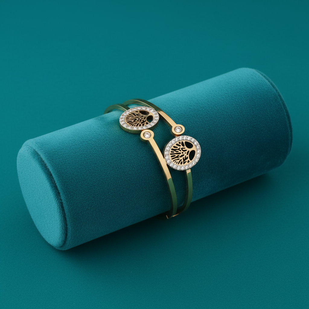 Medallion and diamond bracelet on teal jewelry cushion with teal background