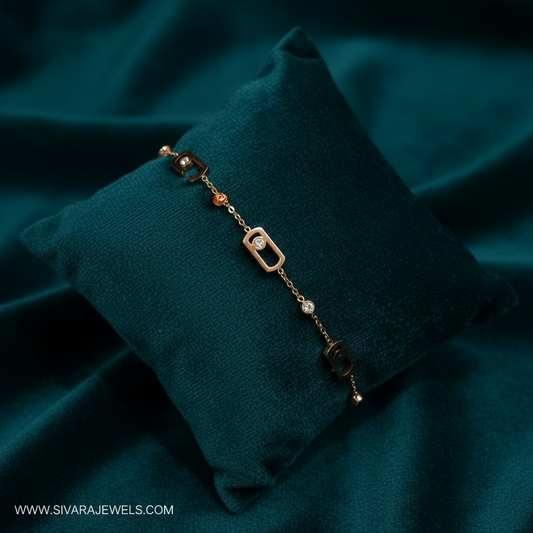 Rose gold rectangular link bracelet on slanted square dark teal cushion