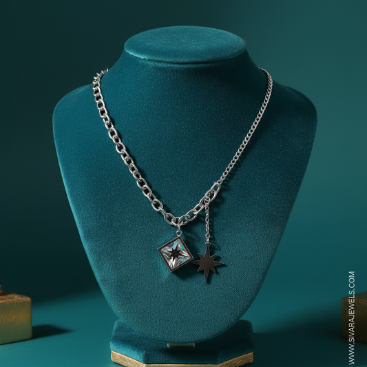 Silver Asymmetric Chain with Tilted Square Crystal and Star on Teal Velvet
