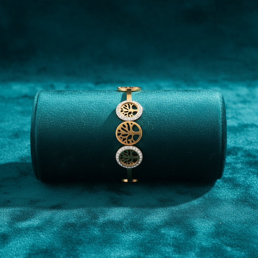 Tree of life medallion bracelet with alternating gold and white on teal cushion