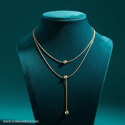 Two-Strand with Gold Beads and Y-Drop on Teal Velvet
