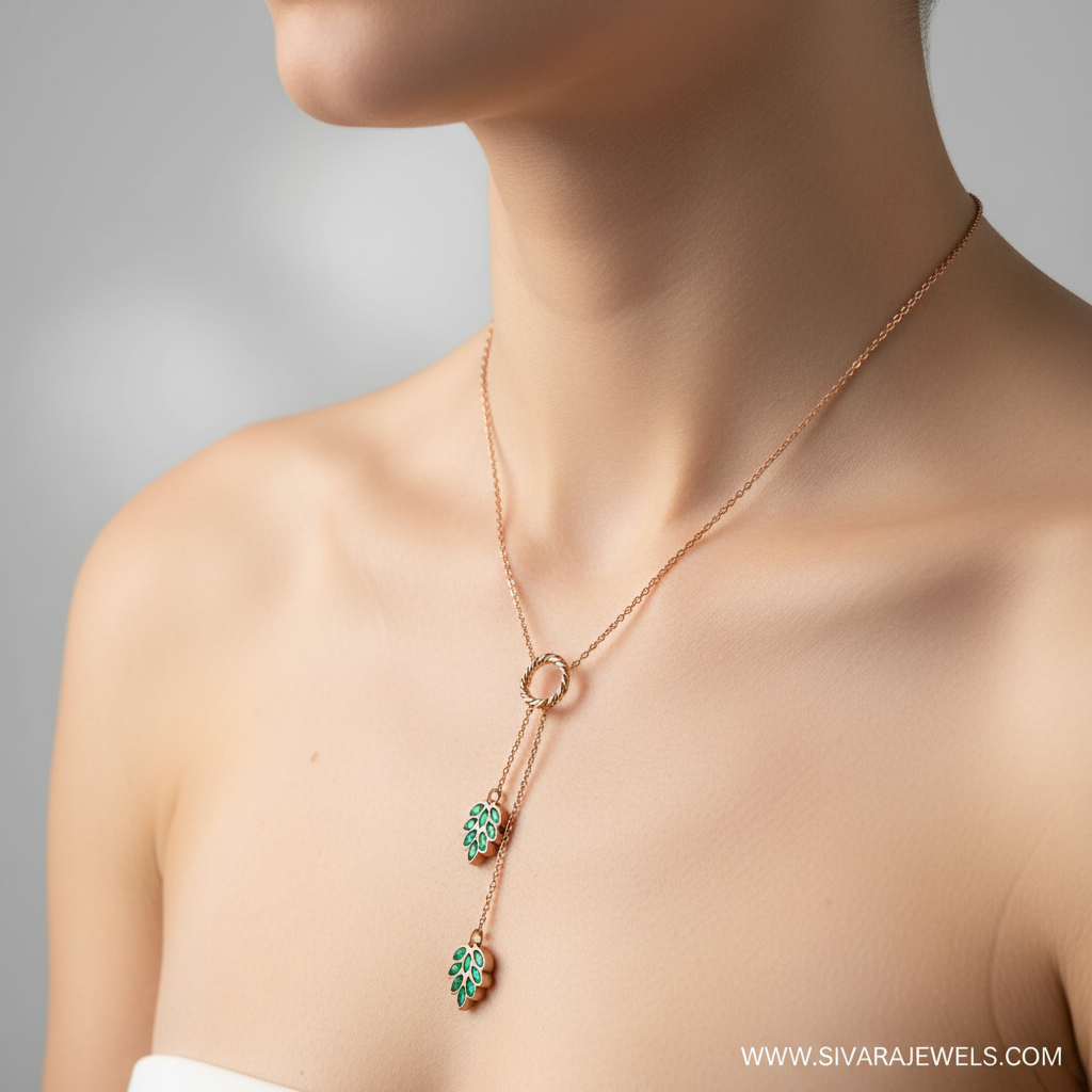 Y-Drop with Emerald Leaves on Slender Neck